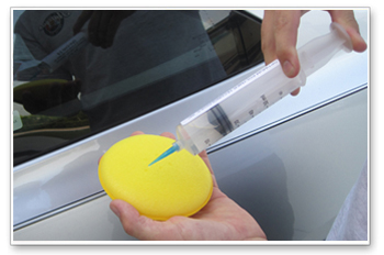 Use isopropyl alcohol to thoroughly clean the car before applying Gloss-Coat.